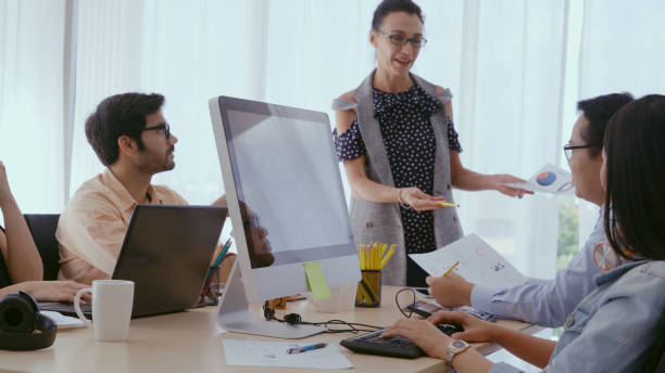 istock Senior leader giving advice speech to team members 1189062891