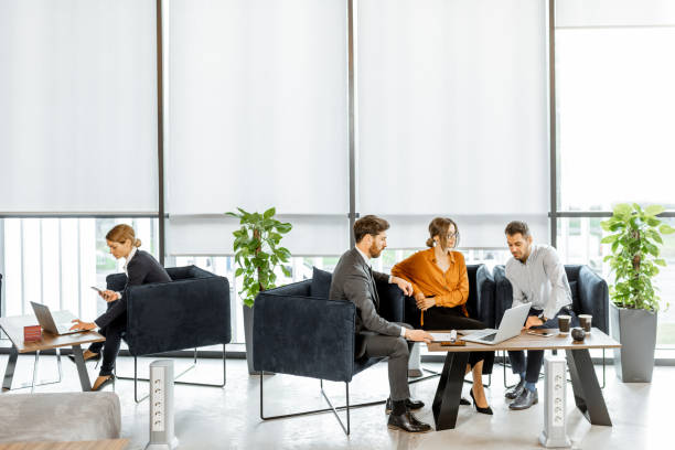 istock Young couple with financial advisor at the office 1189065458