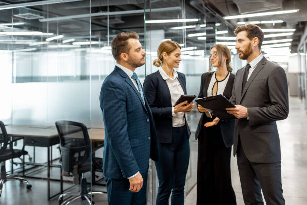 istock Group of business people in the hallway 1189066607