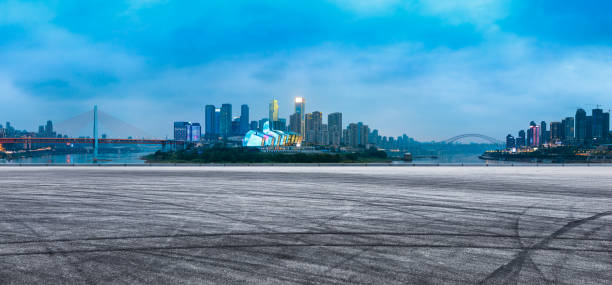 istock Empty asphalt road and urban architectural lights in Chongqing 1189066638