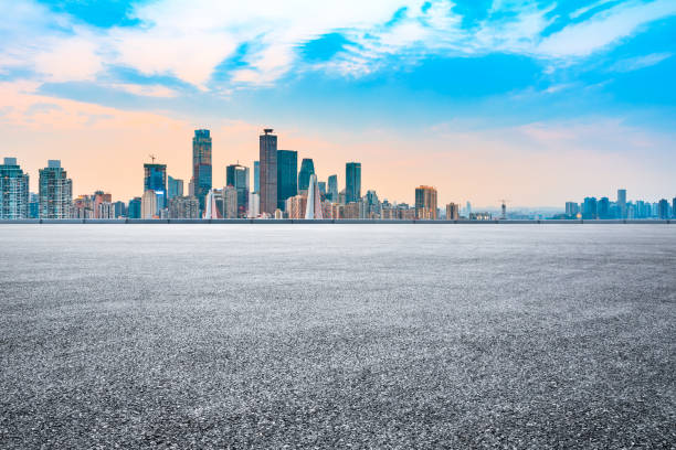 istock Sunset empty asphalt road and city skyline in Chongqing 1189066643