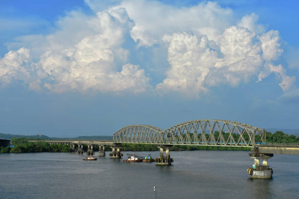 istock Bridge across a river in goa India 1189066968