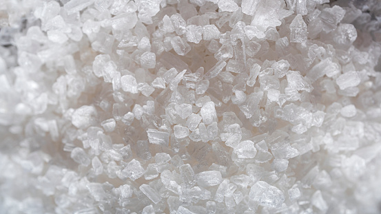 Pure crystals of sea salt. Food product. Macro