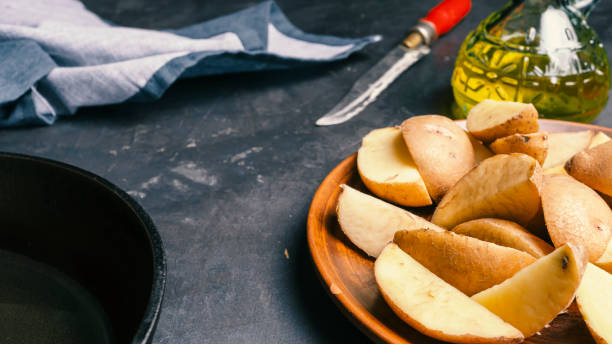 istock freshly cooked, iron skillet, dum aloo, iron frying, frying pan 1189072964