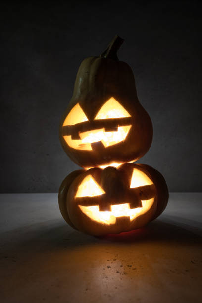 istock Jack o lanterns Halloween pumpkin face 1189078649