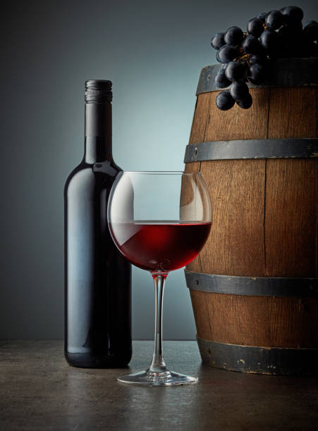 istock glass and bottle of red wine 1189081943