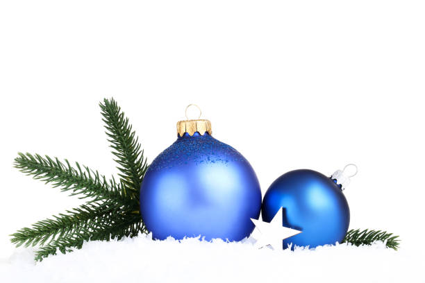 istock Christmas baubles with fir tree branches on white background 1189082496