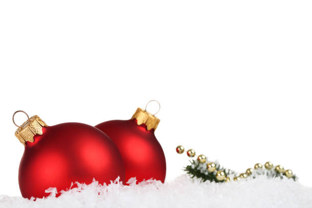 istock Christmas baubles with fir tree branches on white background 1189083970