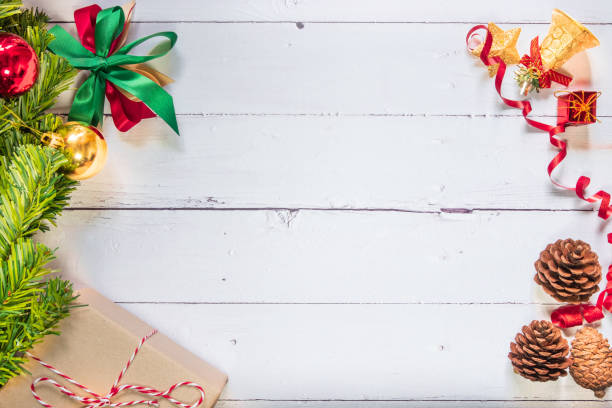 istock Christmas composition festive background. Christmas decorations and xmas gift boxes on wooden white table. Celebration for holiday concept, New Year, winter. Flat lay, top view with copy space 1189085393