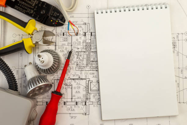istock Still Life Of Electrical Components Arranged On Plans With Copy Space 1189087961