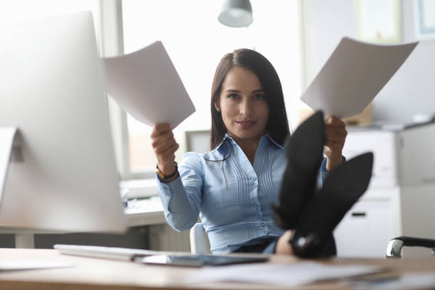 istock Overworked woman at workplace 1189095950