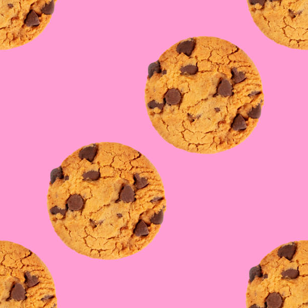 istock Chocolate chip cookies, gluten free, a seamless repeat pattern on a vibrant pink background 1189096024