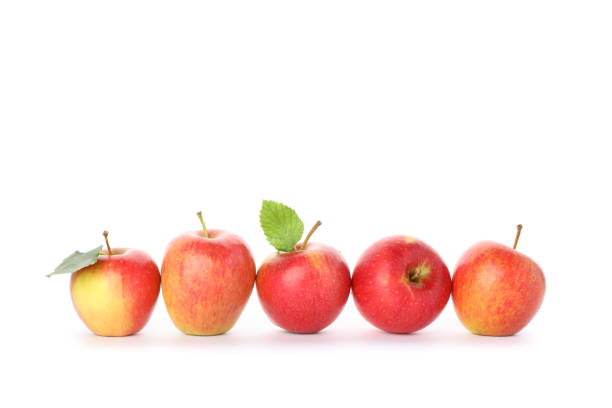 istock Sweet red apples isolated on white background 1189097117