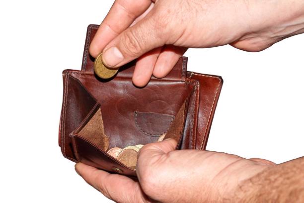 istock Man hand open an wallet isolated on white background with clipping path 1189097595