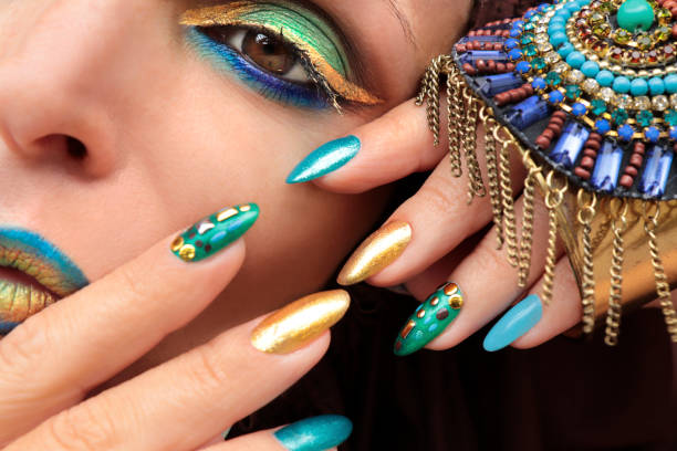 istock Multi-colored fashionable makeup and manicure 1189098280
