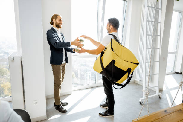 istock Delivering business lunches for the office worker 1189100250
