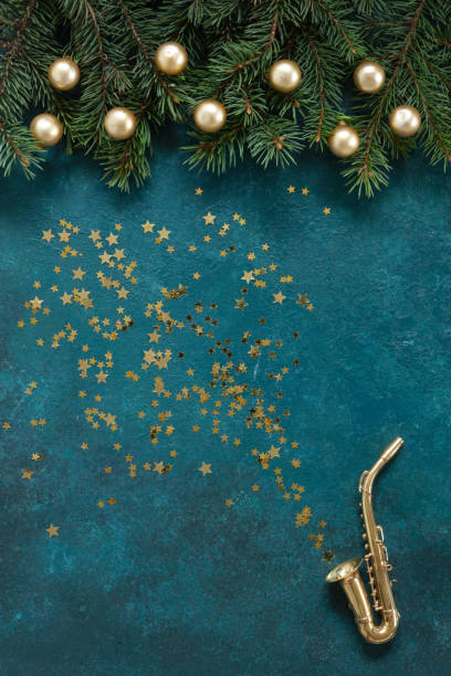 クリスマスの装飾とキラキラとミニチュアゴールデンサックスコピー。 クリスマス、新年のコンセプト。 - ragtime ストックフォトと画像
