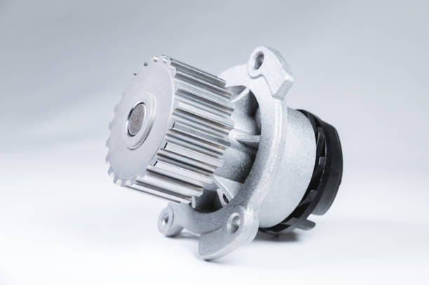 istock New metal automobile pump for cooling an engine water pump on grey background. 1189101402