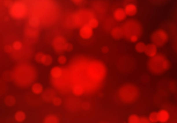 istock Red Abstract Blurry Holiday Lights Background 1189101630