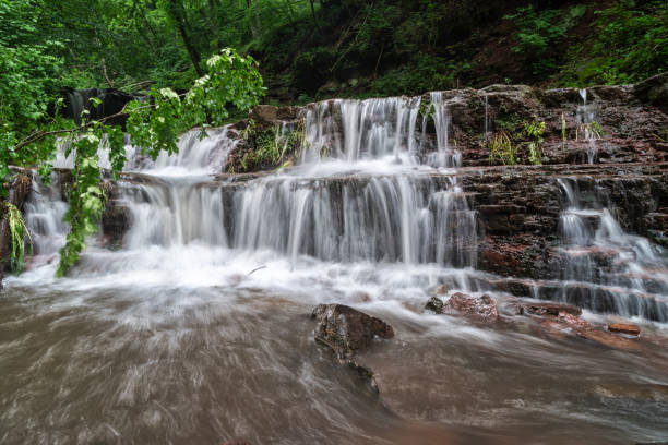 istock Mountain river waterfall landscape. Cascade of Dzhurynskyi waterfall. 1189101665