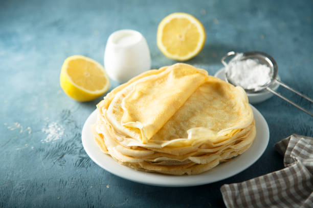 Crepes Homemade crepes served with sugar and lemon date syrup stock pictures, royalty-free photos & images