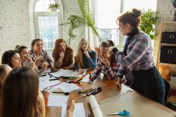 istock Young people discussing about women rights and equality at the office 1189106450