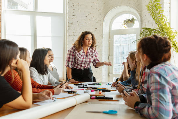 istock Young people discussing about women rights and equality at the office 1189106473