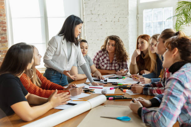 istock Young people discussing about women rights and equality at the office 1189106475