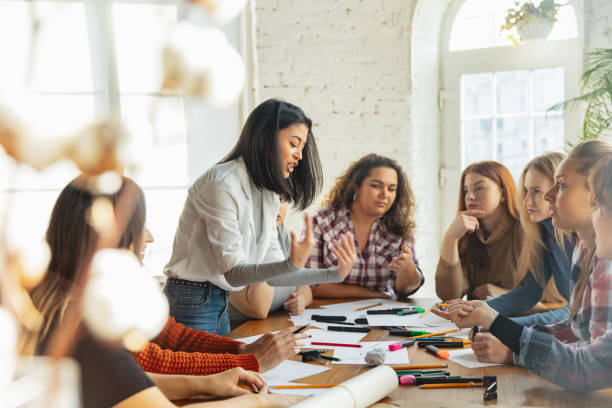 istock Young people discussing about women rights and equality at the office 1189106500