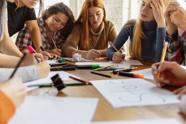 istock Young people discussing about women rights and equality at the office 1189106512