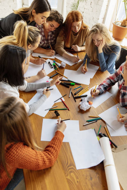 istock Young people discussing about women rights and equality at the office 1189106521