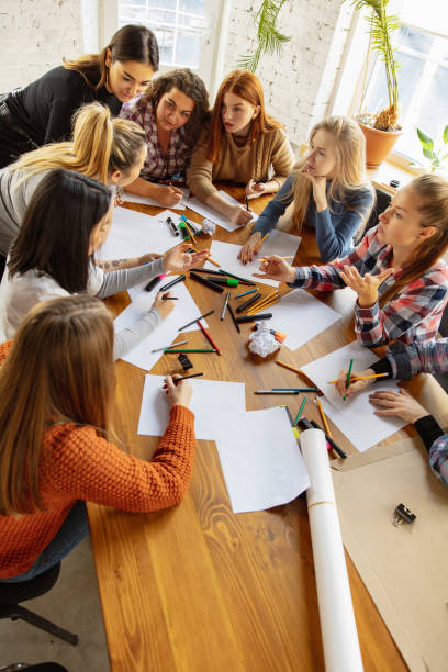 istock Young people discussing about women rights and equality at the office 1189106529