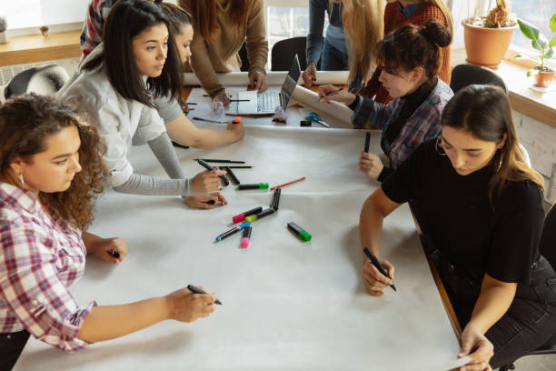 istock Young people discussing about women rights and equality at the office 1189106545
