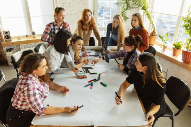 istock Young people discussing about women rights and equality at the office 1189106553