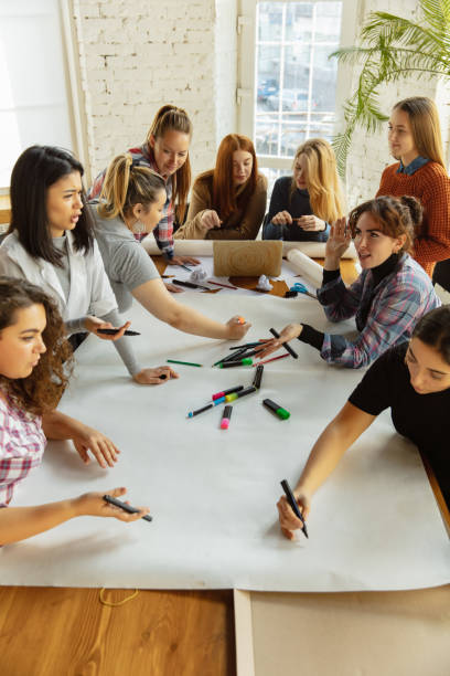 istock Young people discussing about women rights and equality at the office 1189106558