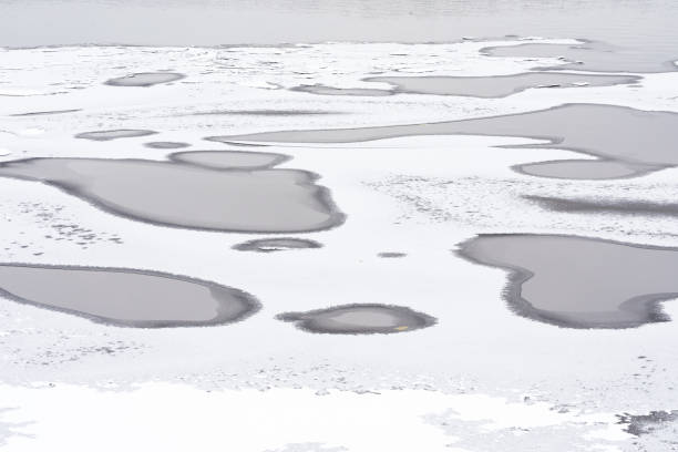 istock River water begins to freeze 1189108941