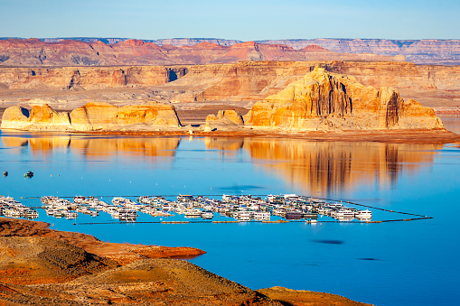 Lake Powell images taken from tour boat on the first tour following the re-opening after Covid.  Photos taken on 12/5/22 Glen Canyon National Recreation area.  Photos demonstrate the mega-drought, with bathtub ring (white or light area from the water to near the tops of the rocks).