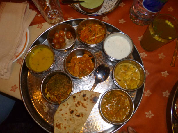 istock Eating Indian food 1189110363