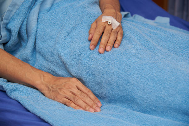 istock Front view of patient hand with needle 1189111509