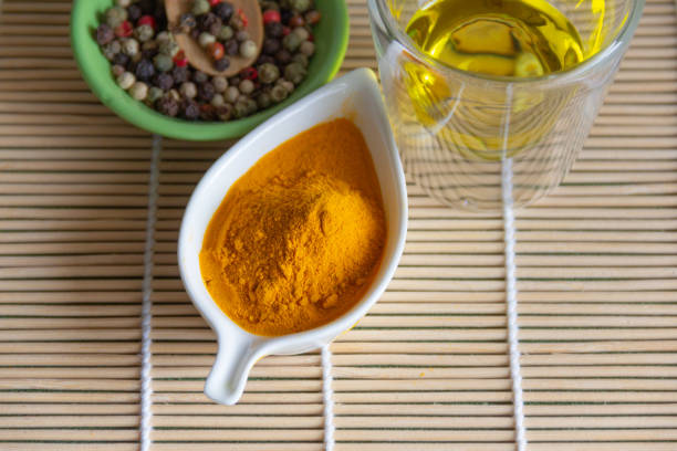 istock Curcuma, pepper and virgin olive oil. 1189113619