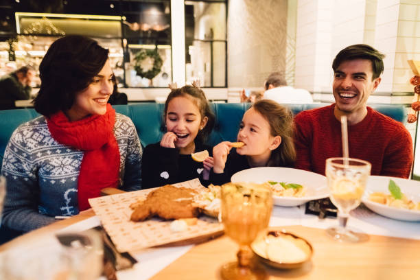 istock Happy family spending Christmas together 1189113671