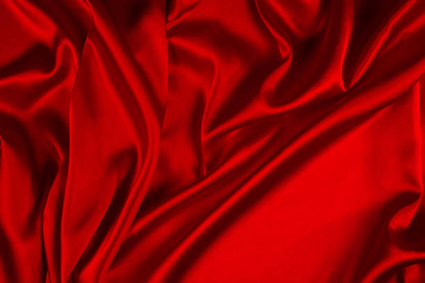 istock Red silk or satin luxury fabric texture can use as abstract background. Top view. 1189115088
