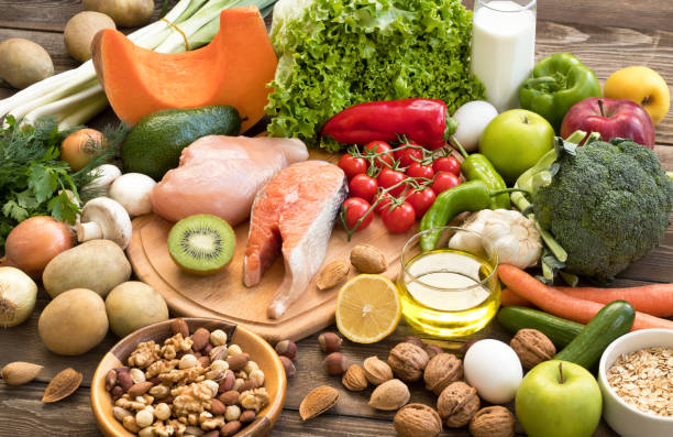 istock Balanced diet - healthy food on wooden table 1189117530