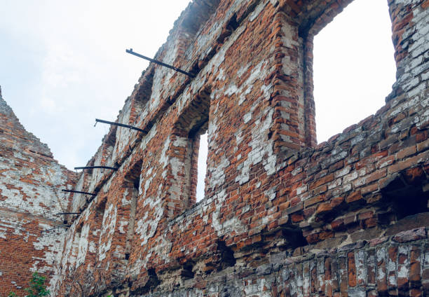istock Old abandoned ruined building without a roof and windows 1189118010