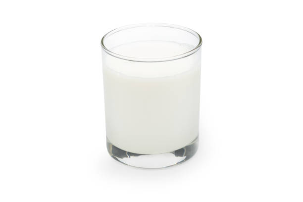 Pasteurized fresh milk in the glass on white background with clipping path.