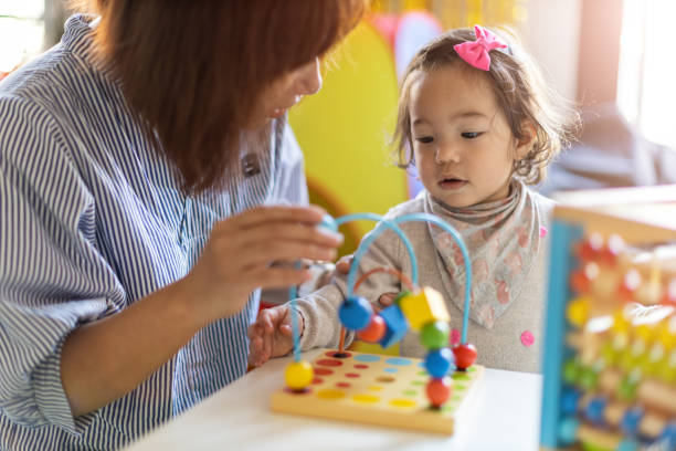istock Mother playing with her baby 1189121997