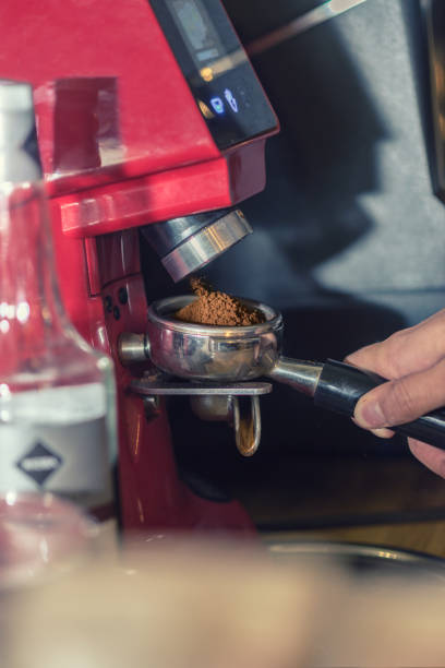 istock Grinding coffee barista is preparing coffee. 1189122061