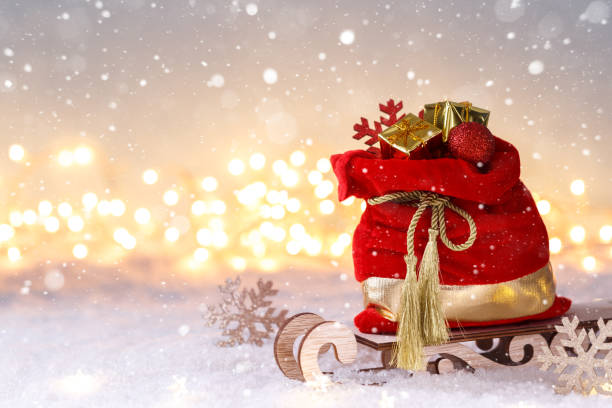 サンタクロースレッドサック - santa claus gift snow sack ストックフォトと画像