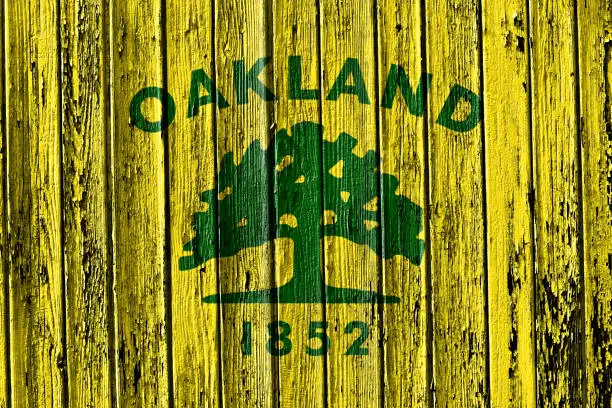 flag of Oakland painted on wooden frame