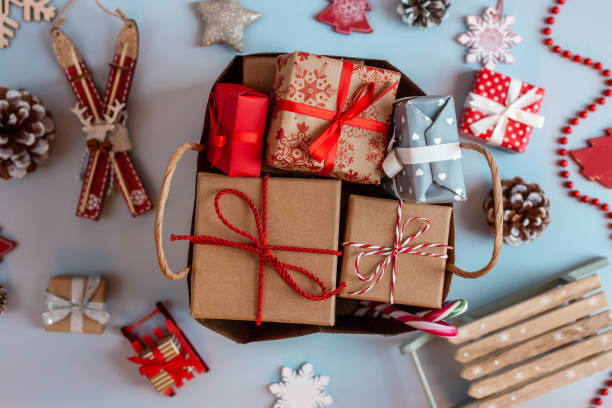 istock christmas wrapped paper gift boxes and decoration 1189124704